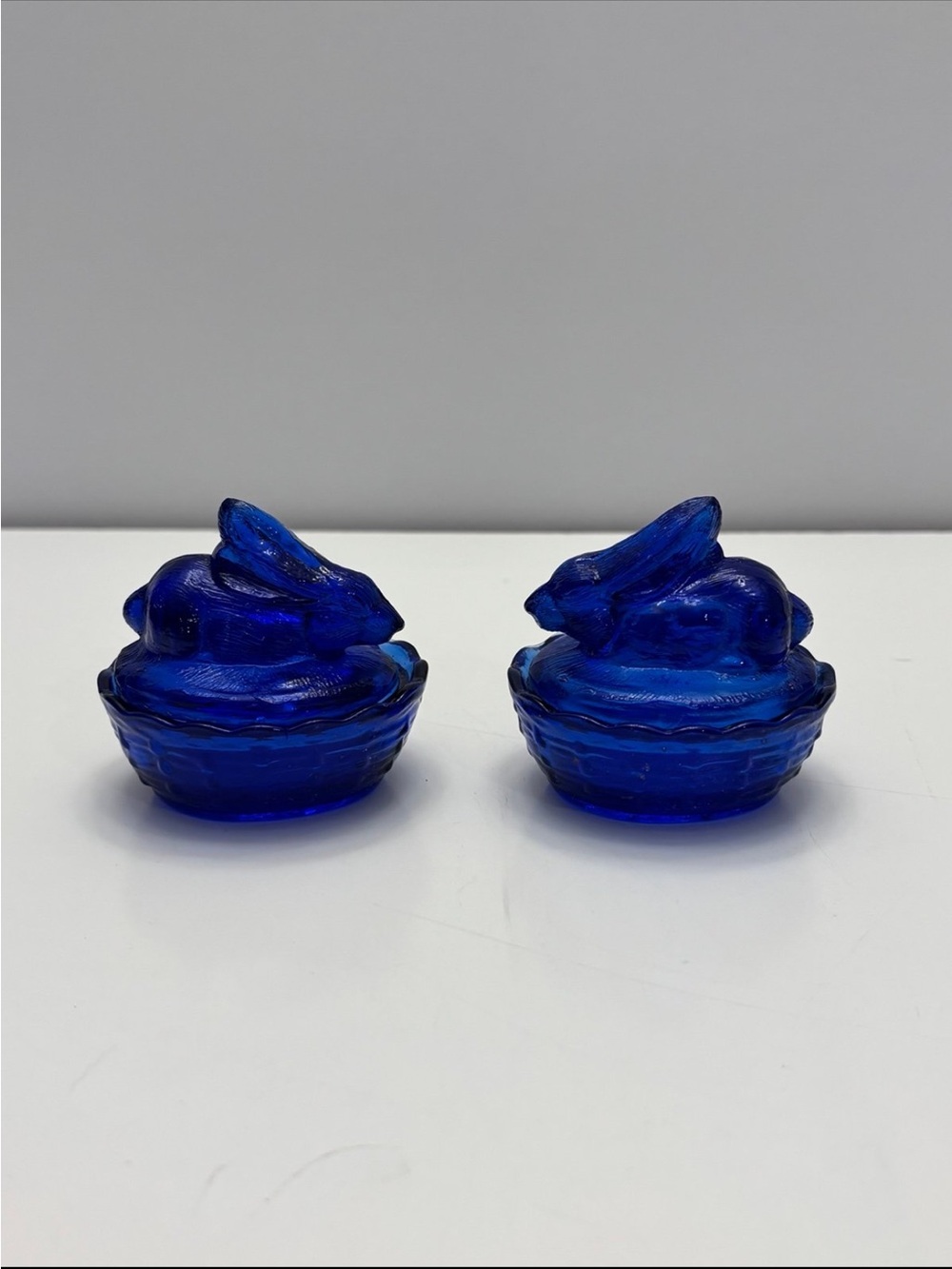 Pair of vintage mini cobalt blue bunny on nest salt cellar